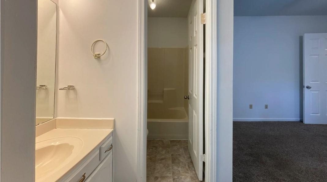 6659 Elmore Ridge Lane Memphis, TN 38134 - Photo 4 of 8 Bathroom with vanity and separate shower and tub