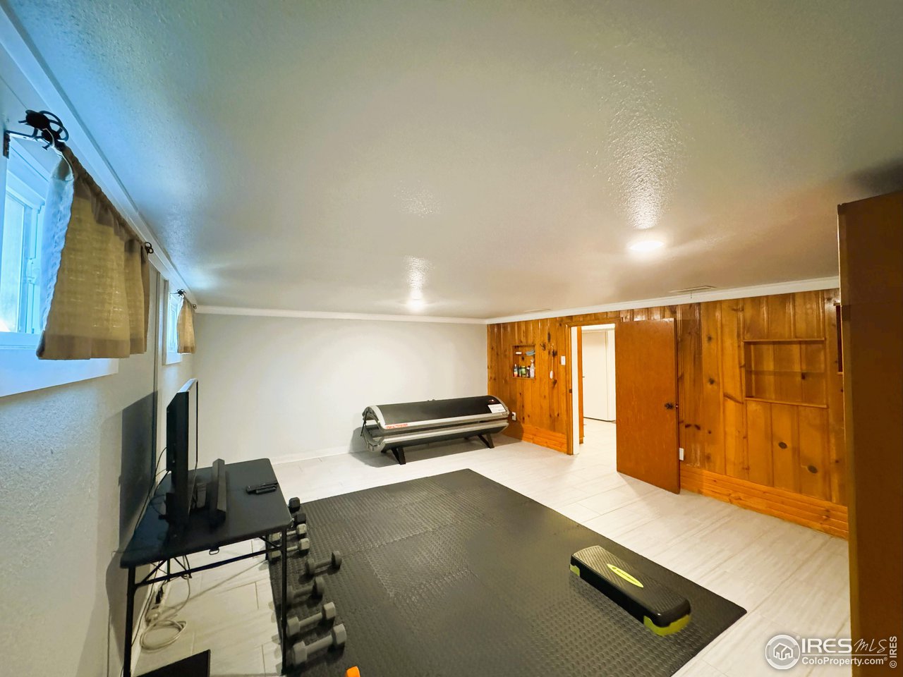 624 Fairhurst Street Sterling, CO 80751 - Photo 23 of 27 a view of a room with gym equipment