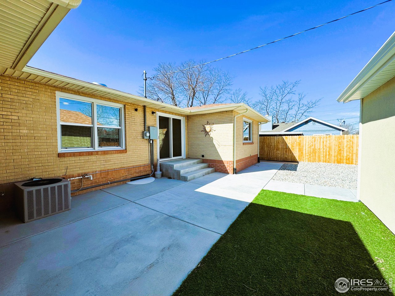 624 Fairhurst Street Sterling, CO 80751 - Photo 24 of 27 a view of a house with a yard