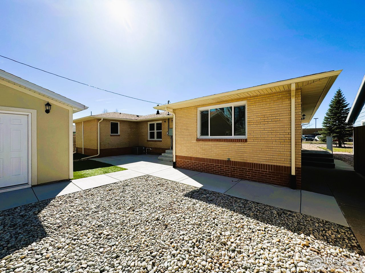 624 Fairhurst Street Sterling, CO 80751 - Photo 25 of 27 a view of a house with a backyard