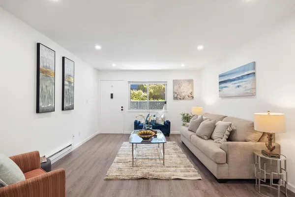 a living room with furniture and a couch