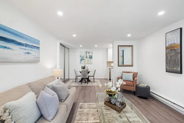 a living room with furniture and a couch