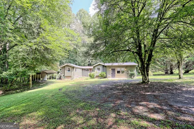 front view of a house with a yard