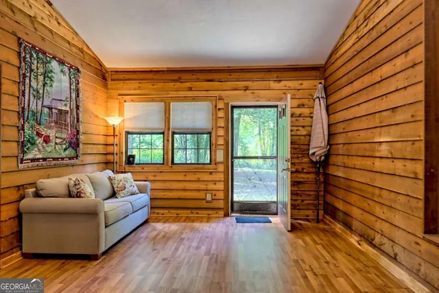 a view of house with a yard