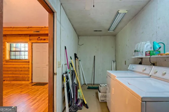 a kitchen that has a sink and a stove
