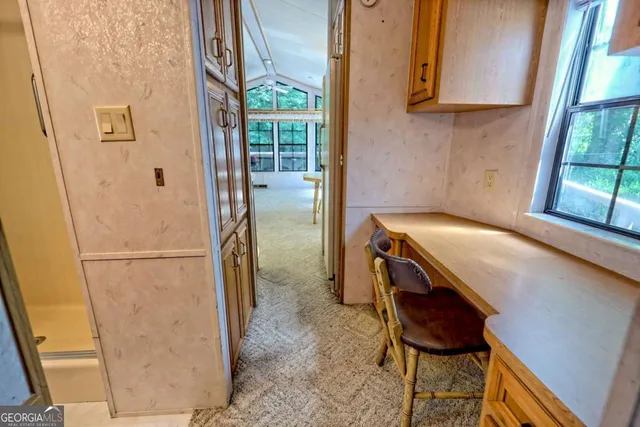 a view of a balcony with chairs