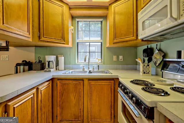 a balcony with wooden floor and outdoor space