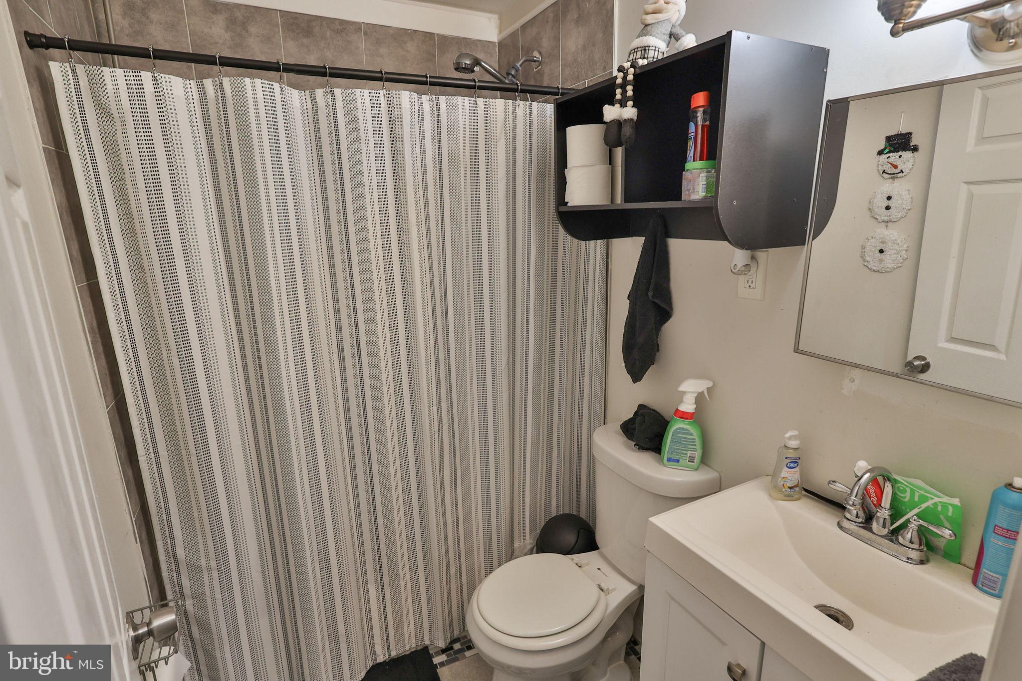 708 Ward Street Chester, PA 19013 - Photo 12 of 44 a bathroom with a toilet and sink