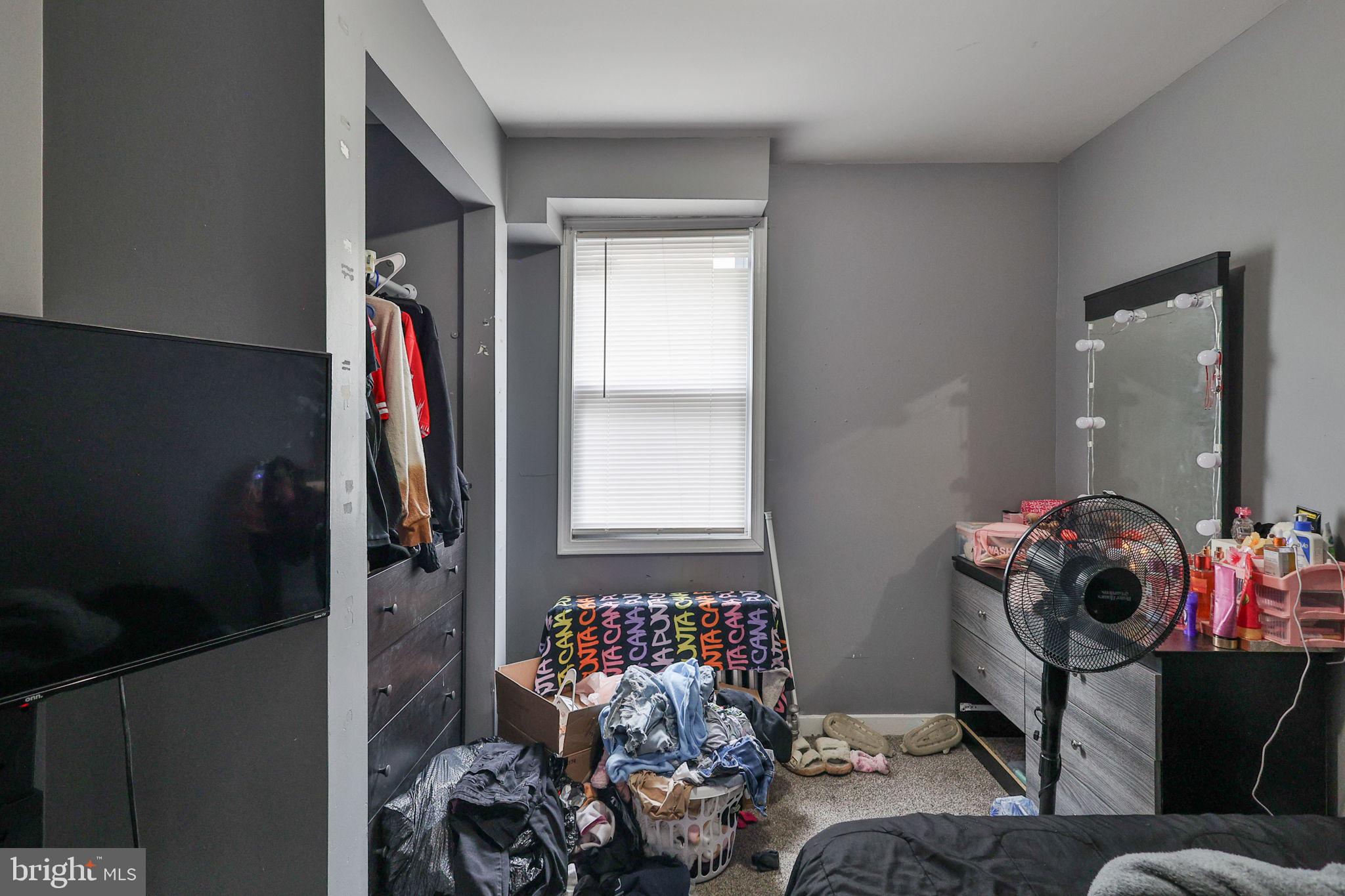 708 Ward Street Chester, PA 19013 - Photo 19 of 44 a room with furniture and a window