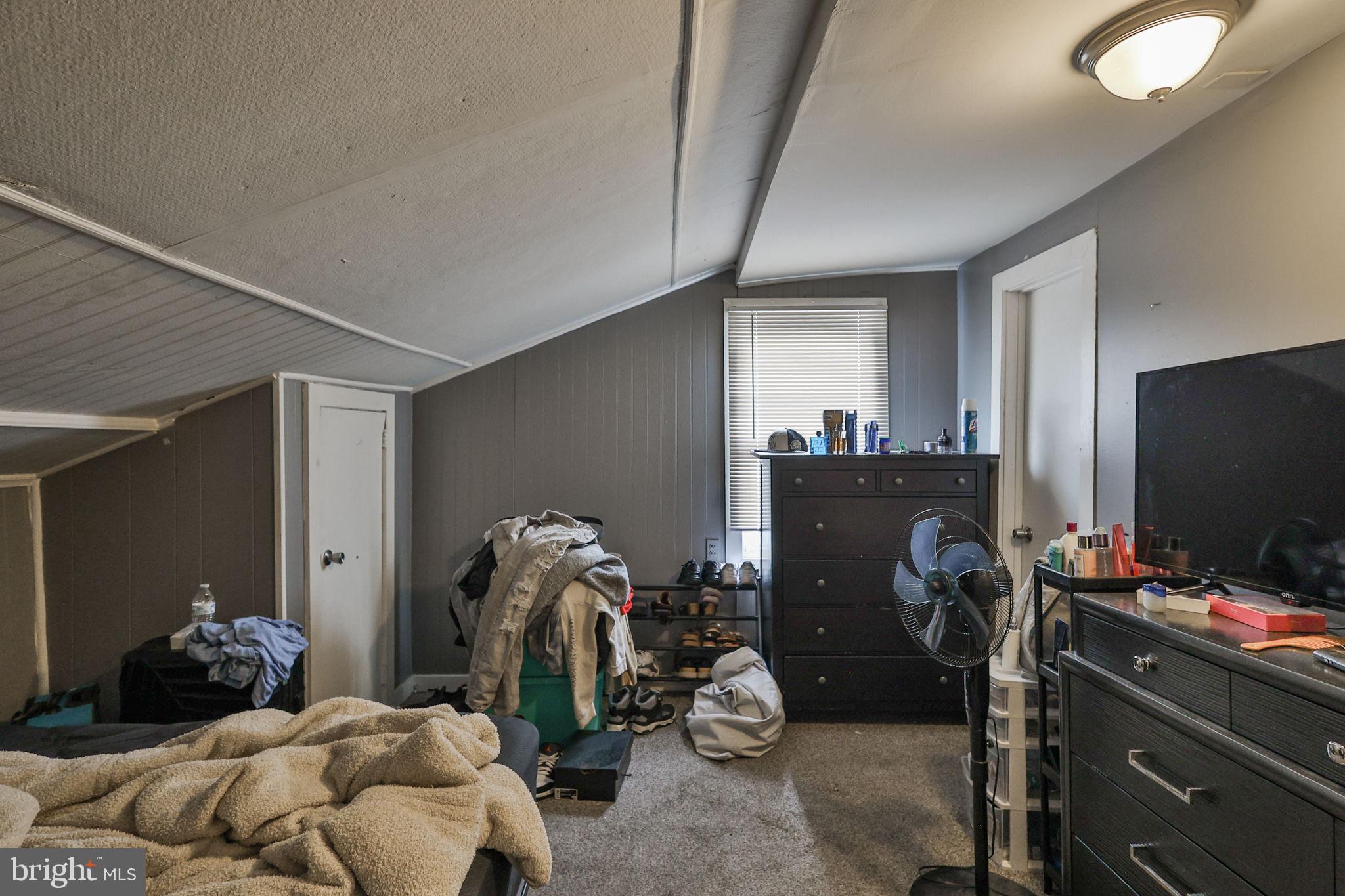 708 Ward Street Chester, PA 19013 - Photo 22 of 44 a bedroom with furniture and a closet