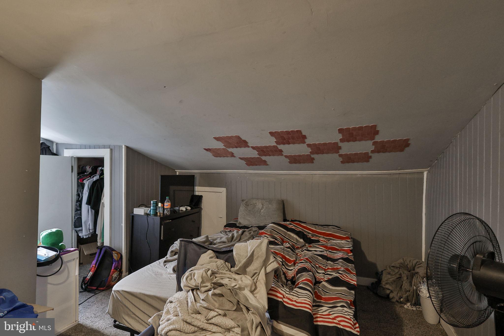 708 Ward Street Chester, PA 19013 - Photo 24 of 44 a bedroom with bed and a couch