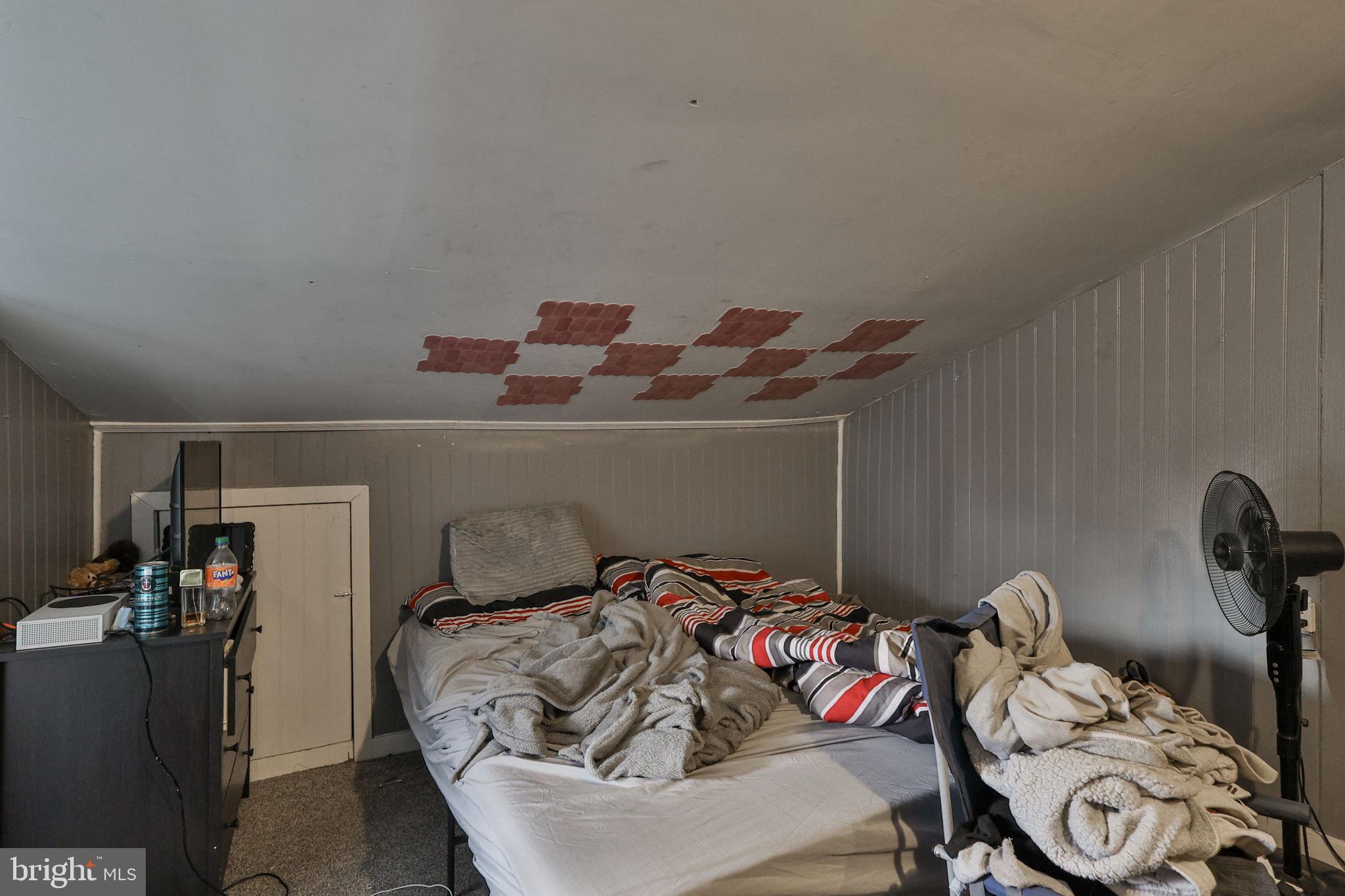 708 Ward Street Chester, PA 19013 - Photo 25 of 44 a bedroom with a bed and cabinets