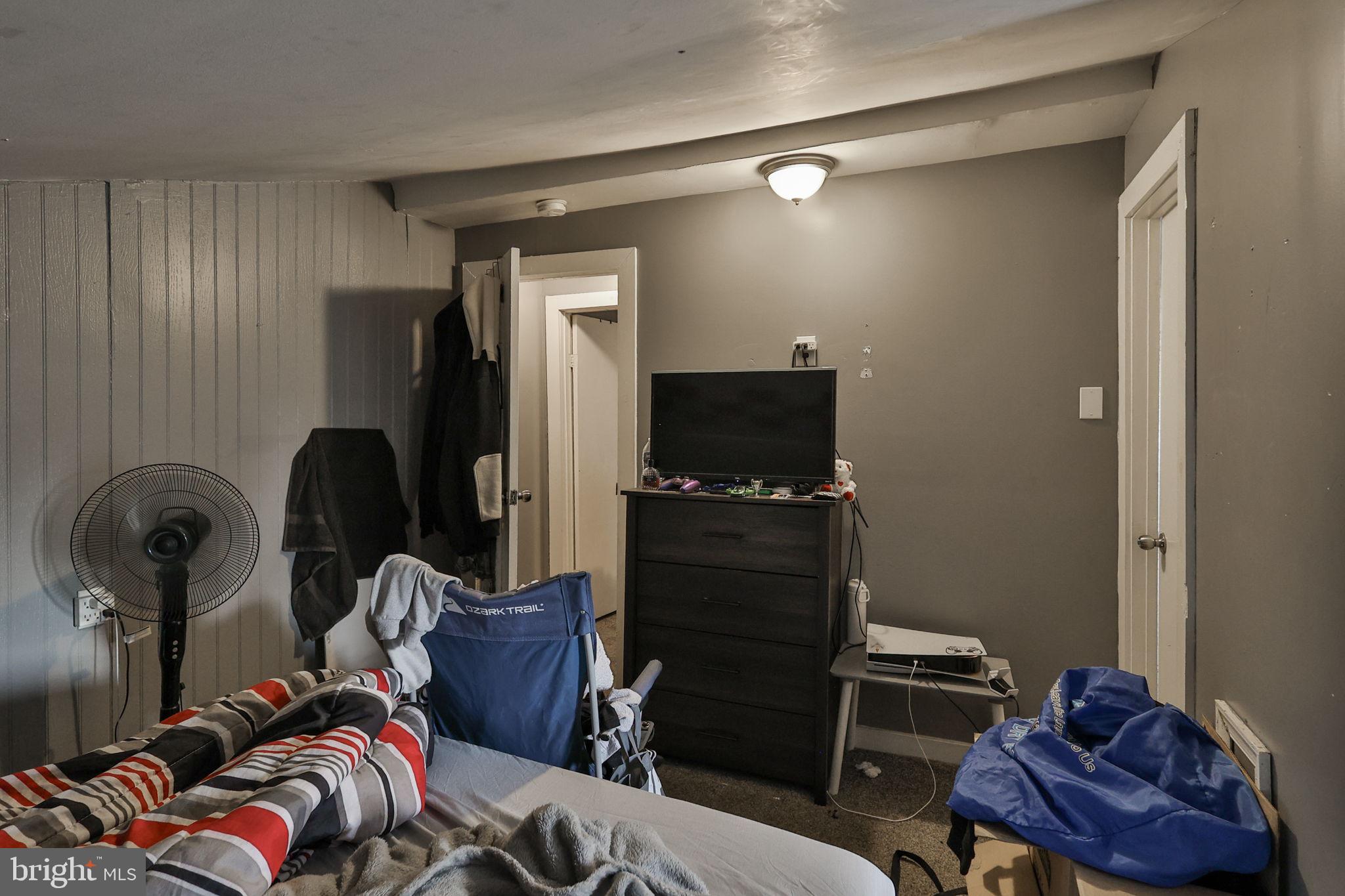 708 Ward Street Chester, PA 19013 - Photo 27 of 44 a room with furniture closet and a mirror