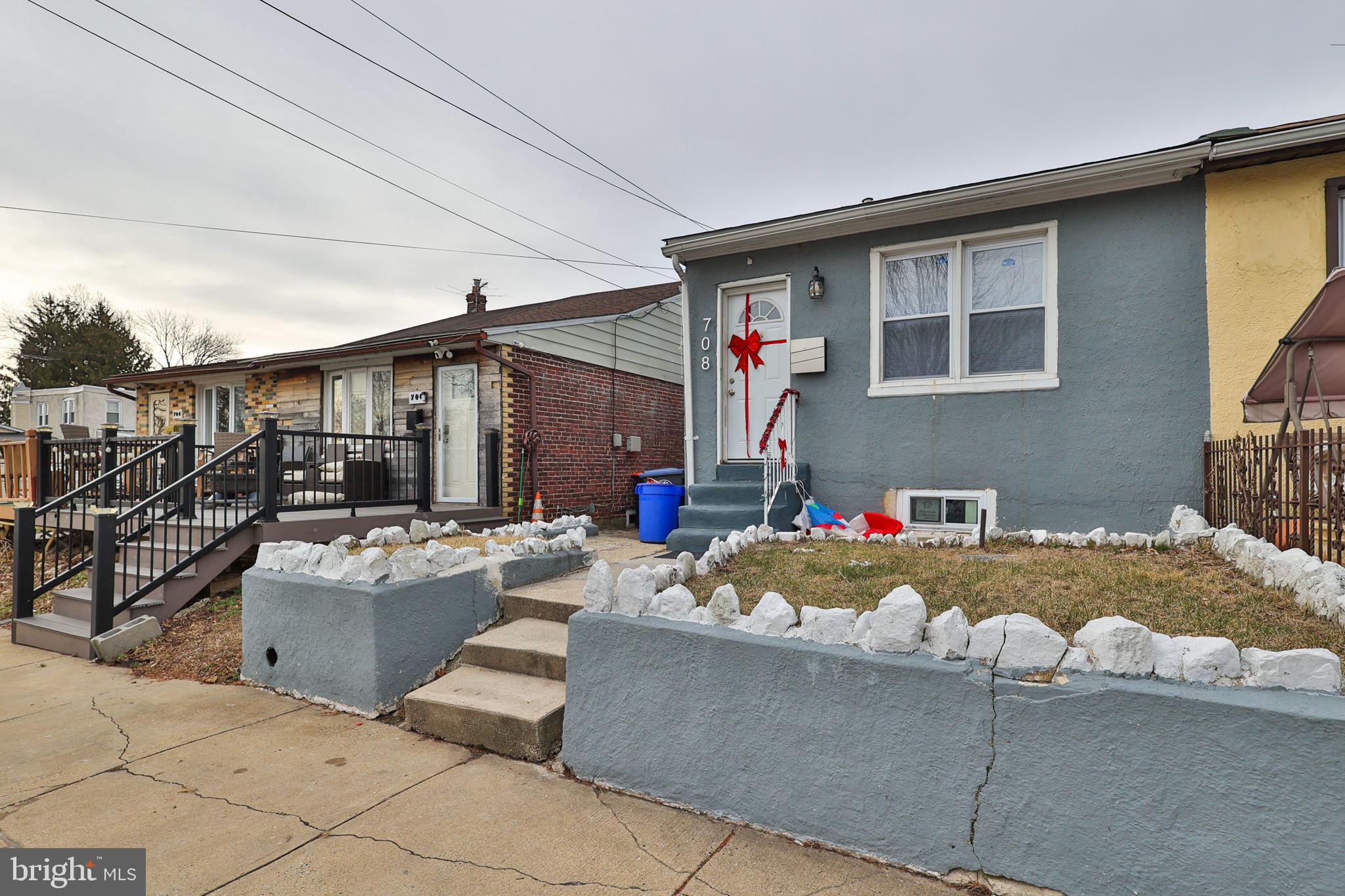 708 Ward Street Chester, PA 19013 - Photo 3 of 44 a front view of a house with patio