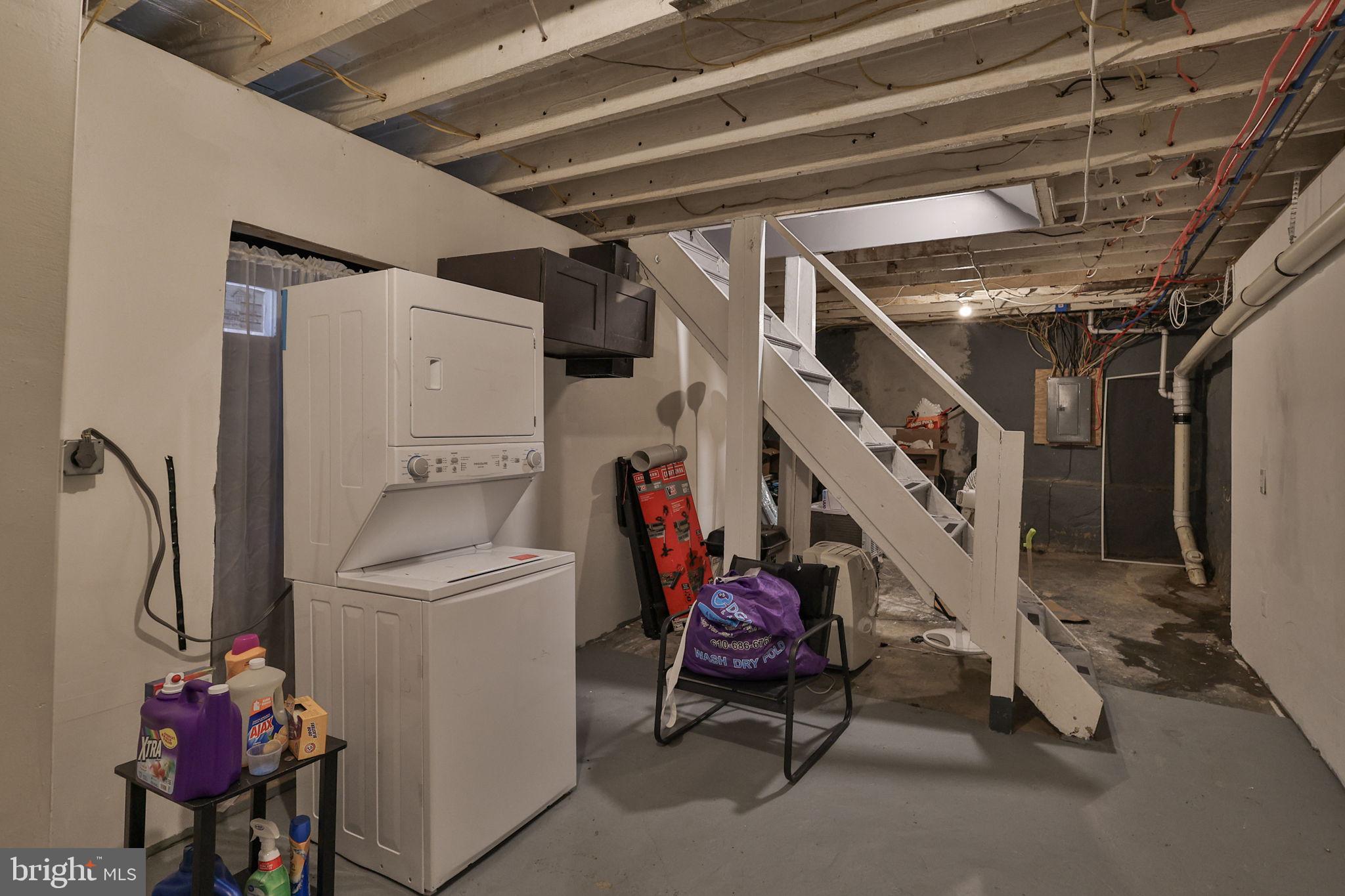 708 Ward Street Chester, PA 19013 - Photo 33 of 44 a utility room with dryer and washer