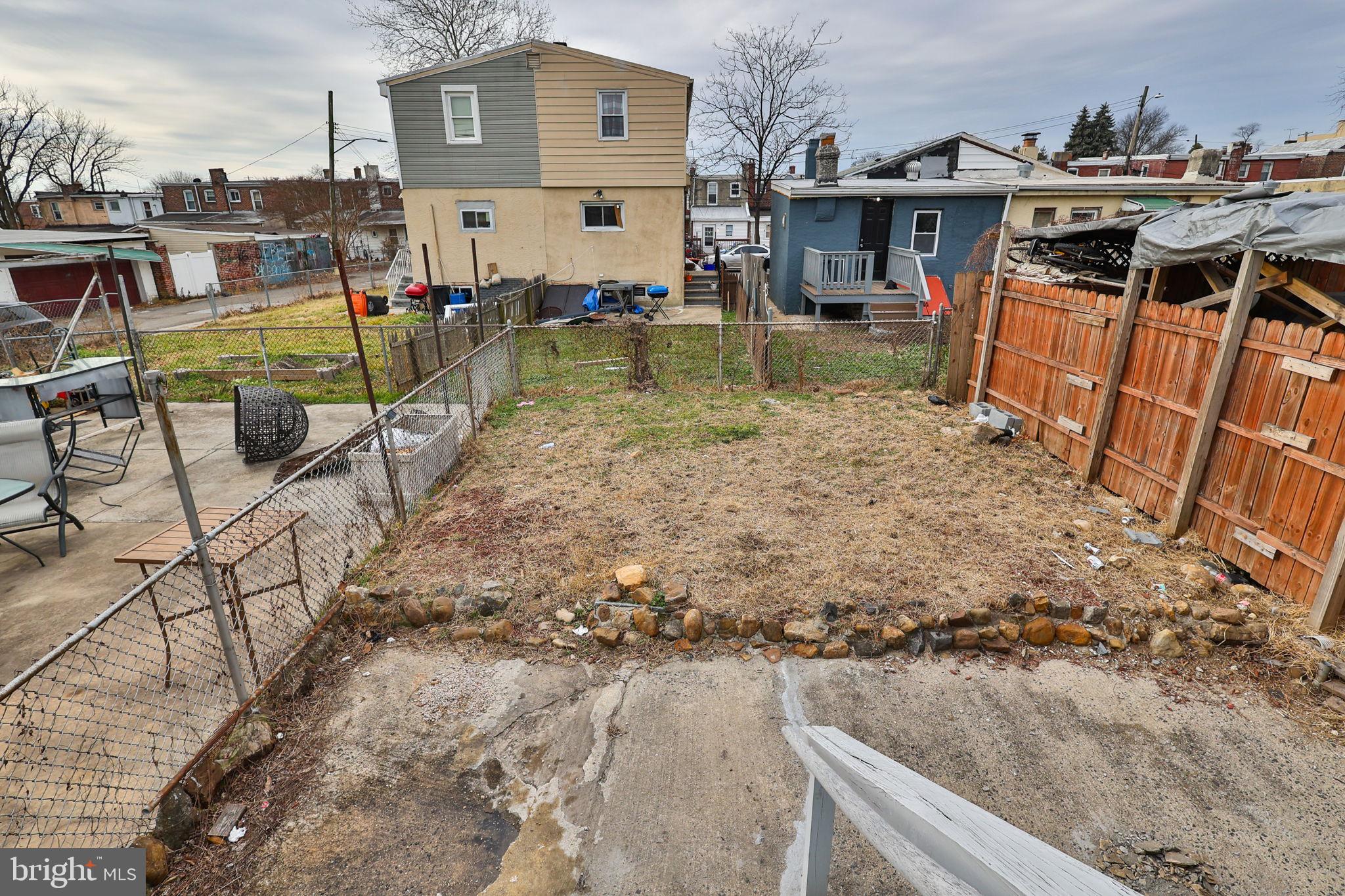 708 Ward Street Chester, PA 19013 - Photo 38 of 44 a view of a house with backyard
