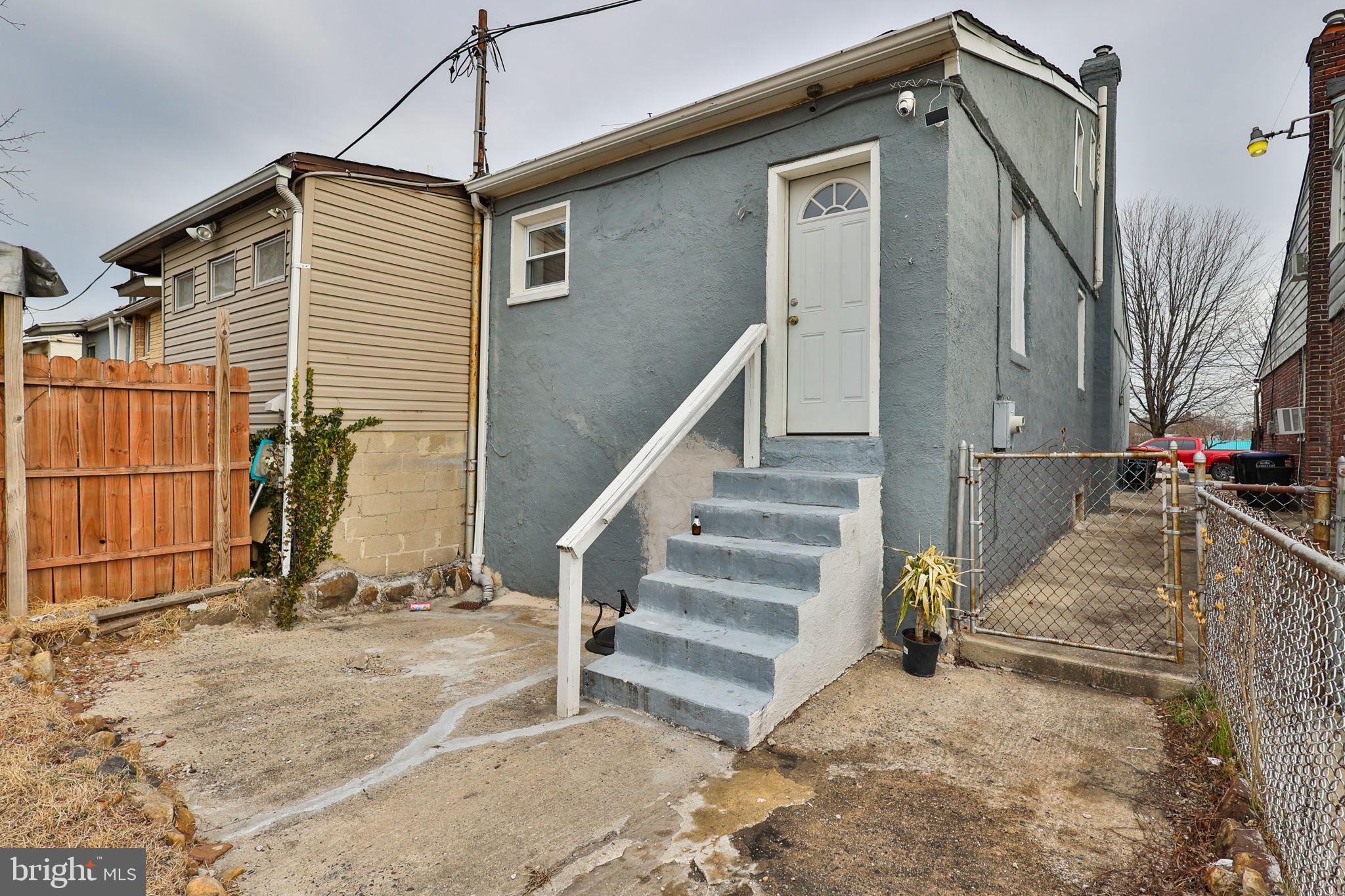 708 Ward Street Chester, PA 19013 - Photo 41 of 44 a view of a house with wooden floor next to a road