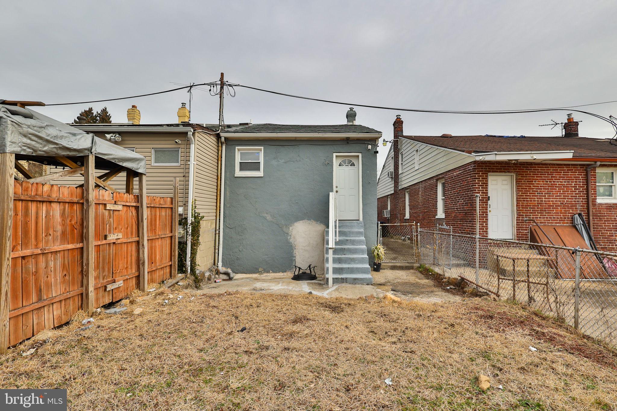 708 Ward Street Chester, PA 19013 - Photo 42 of 44 a view of a house with wooden fence