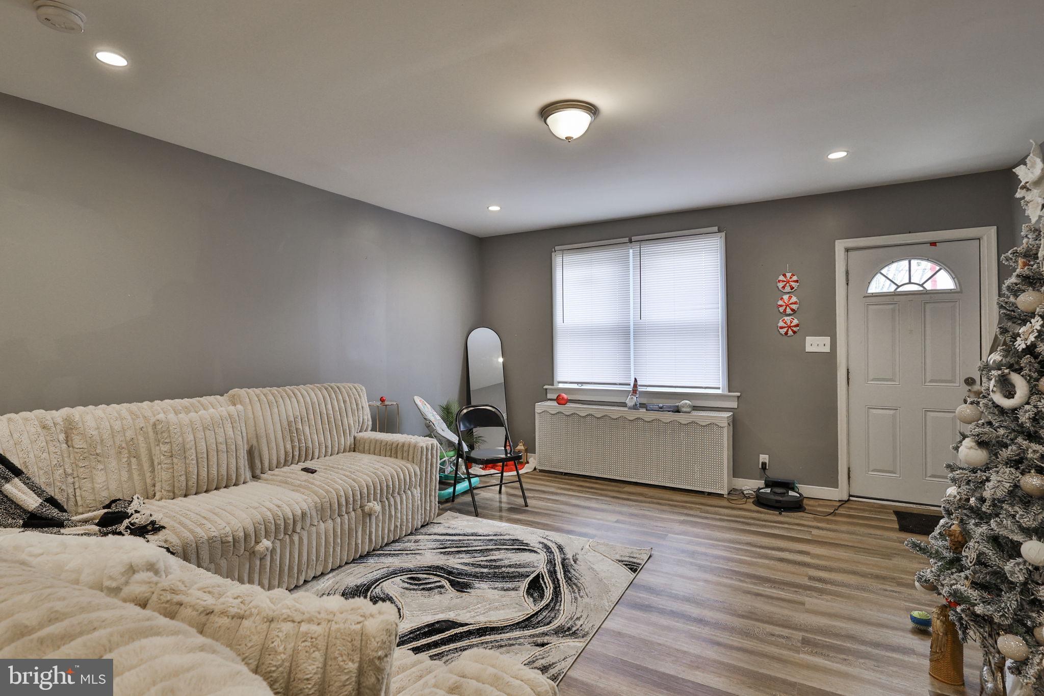708 Ward Street Chester, PA 19013 - Photo 8 of 44 a living room with furniture and a couch