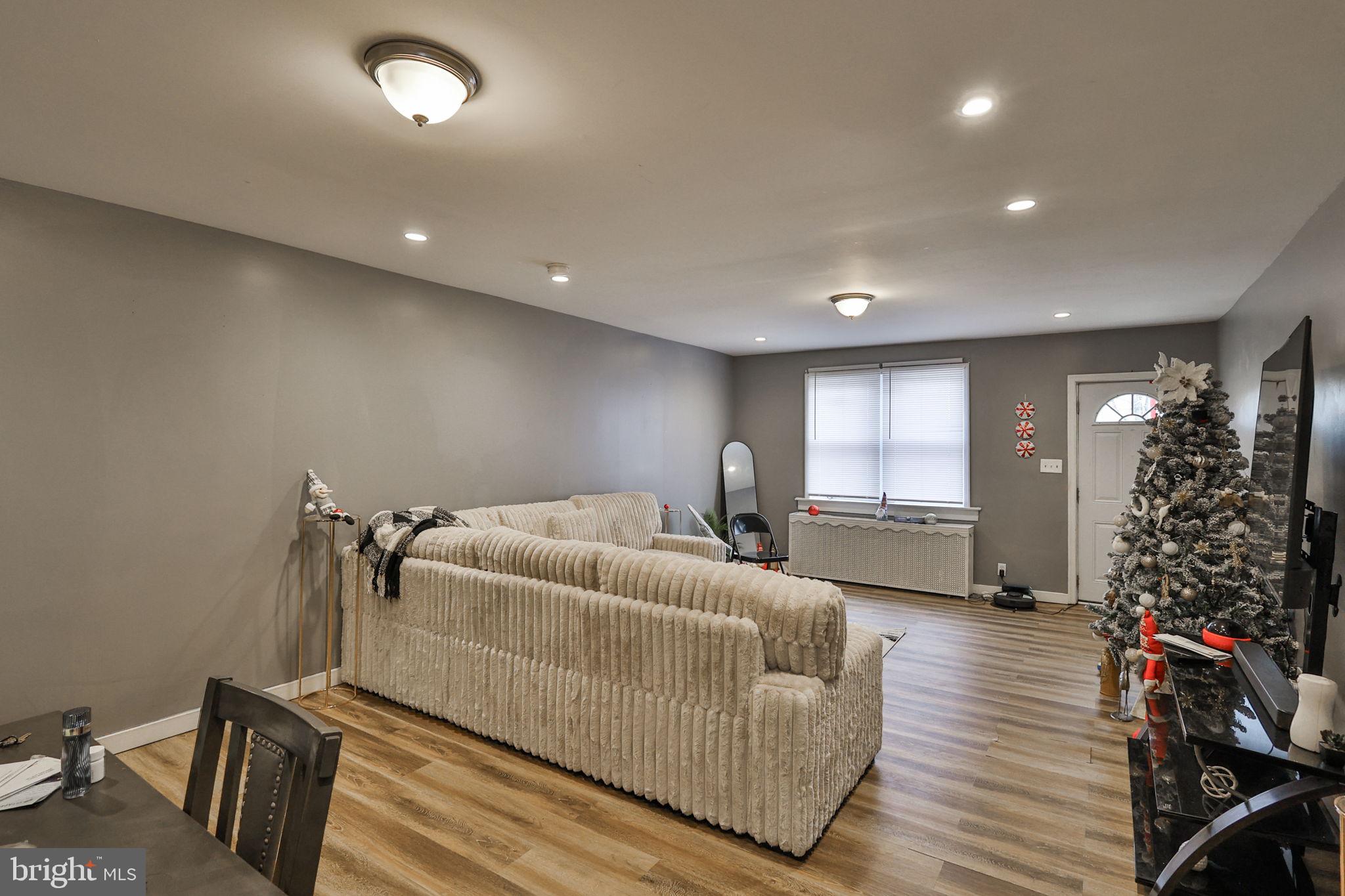 708 Ward Street Chester, PA 19013 - Photo 10 of 44 a living room with furniture and a potted plant