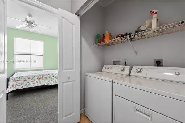 a utility room with dryer and washer