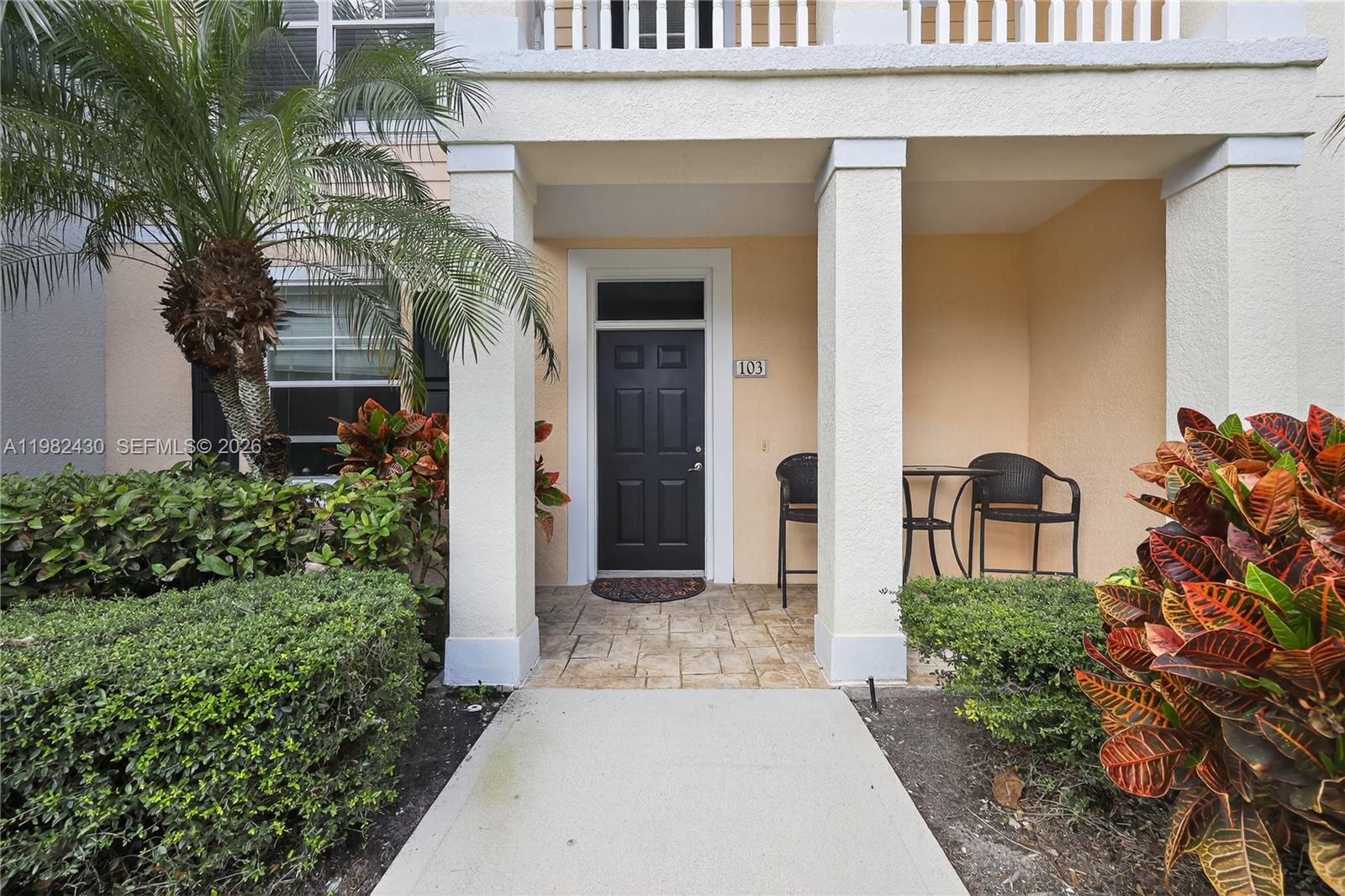 156 Aragon Way, Unit 103 Jupiter, FL 33458 - Photo 4 of 30 front view of a house