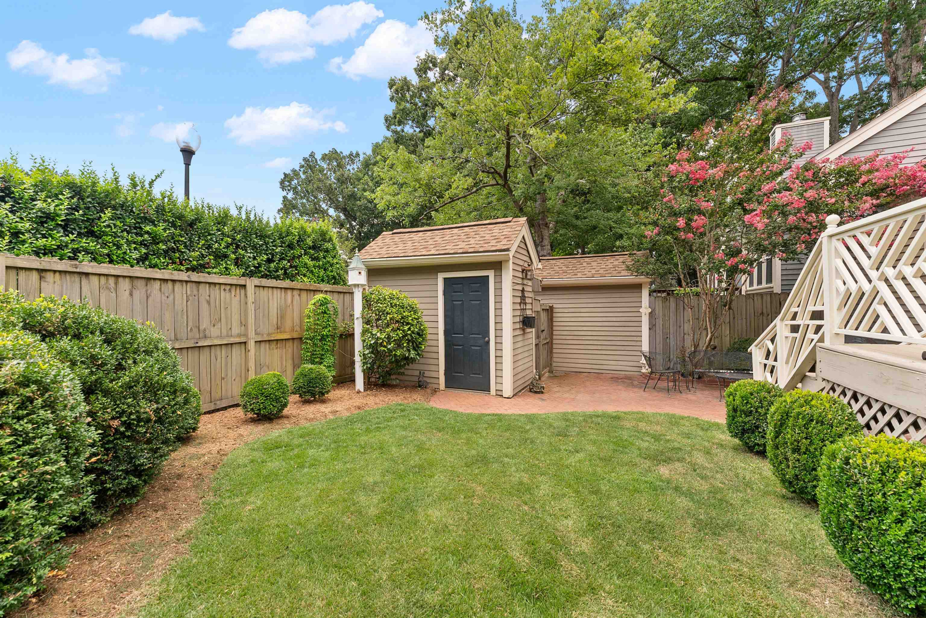 6007 Sentinel Drive Raleigh, NC 27609 - Photo 4 of 33 Private courtyard area to enjoy relaxing outdoors. Garden Shed inside courtyard area. Fenced in yard