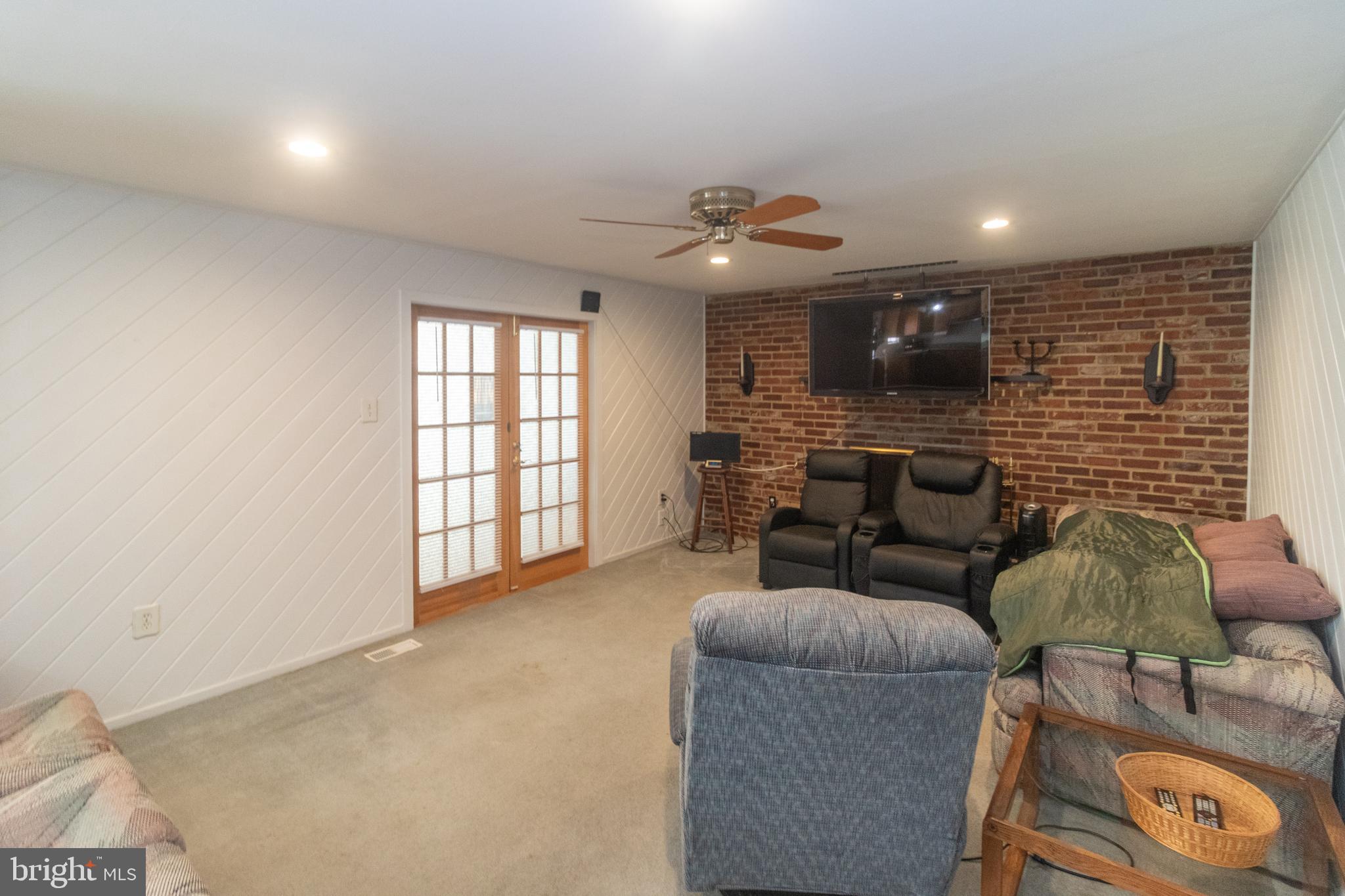 25 Champlain Road Marlton, NJ 08053 - Photo 13 of 35 a living room with furniture and a large window