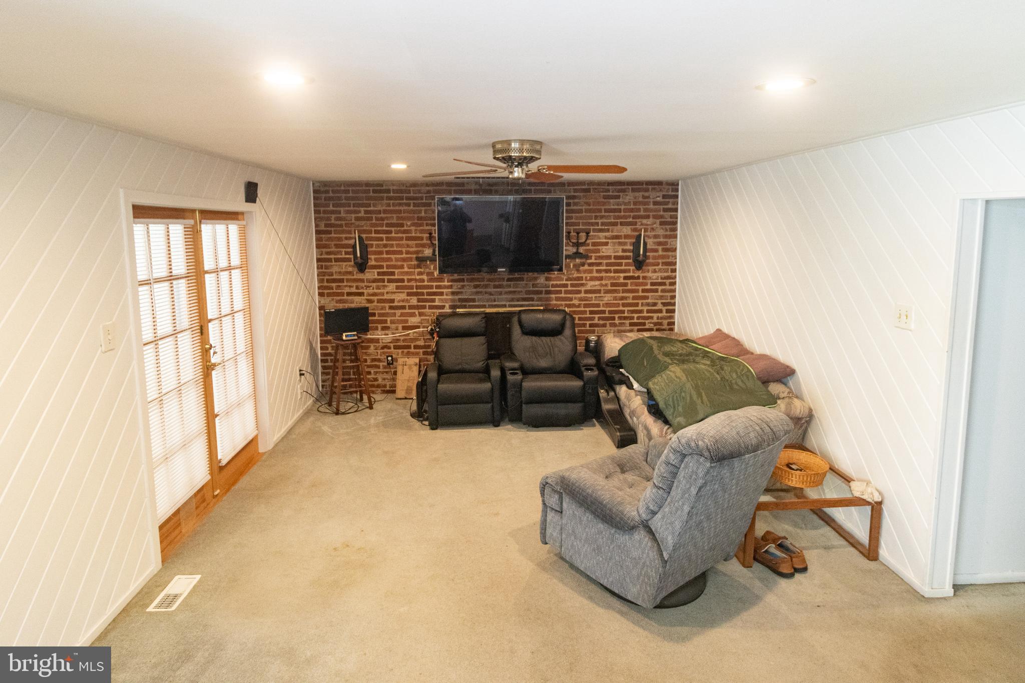 25 Champlain Road Marlton, NJ 08053 - Photo 14 of 35 a living room with furniture and a flat screen tv