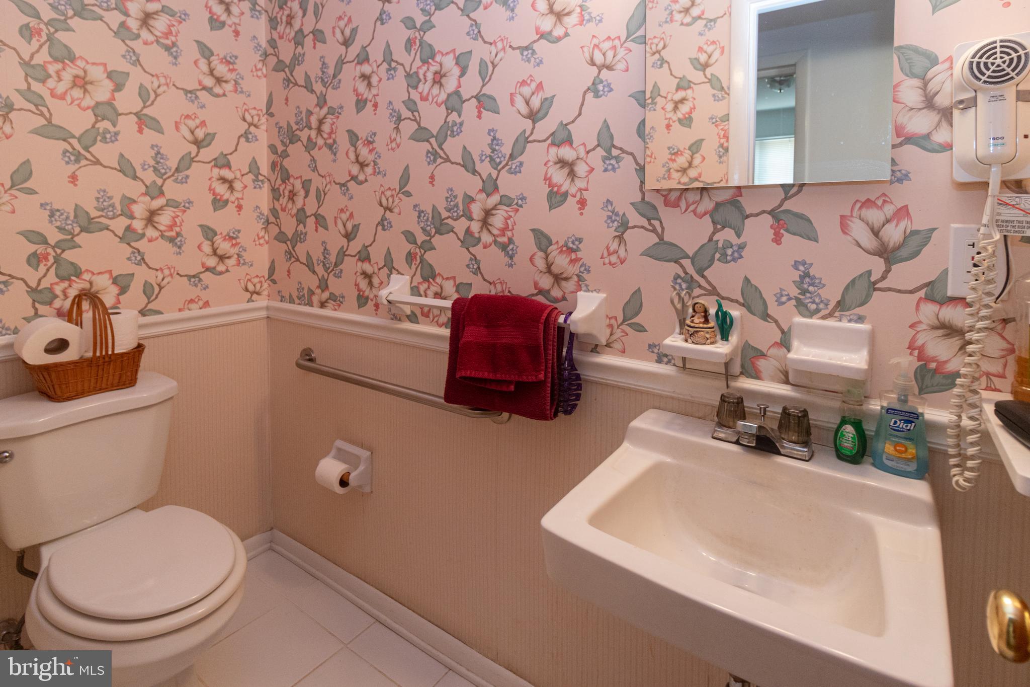 25 Champlain Road Marlton, NJ 08053 - Photo 15 of 35 a bathroom with a toilet and a sink