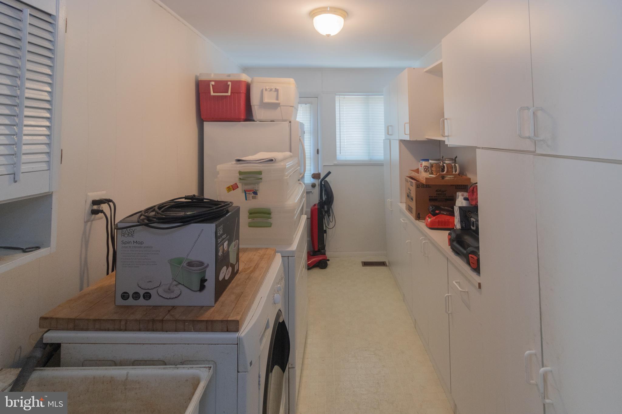 25 Champlain Road Marlton, NJ 08053 - Photo 16 of 35 a view of storage and utility room with two washing machine
