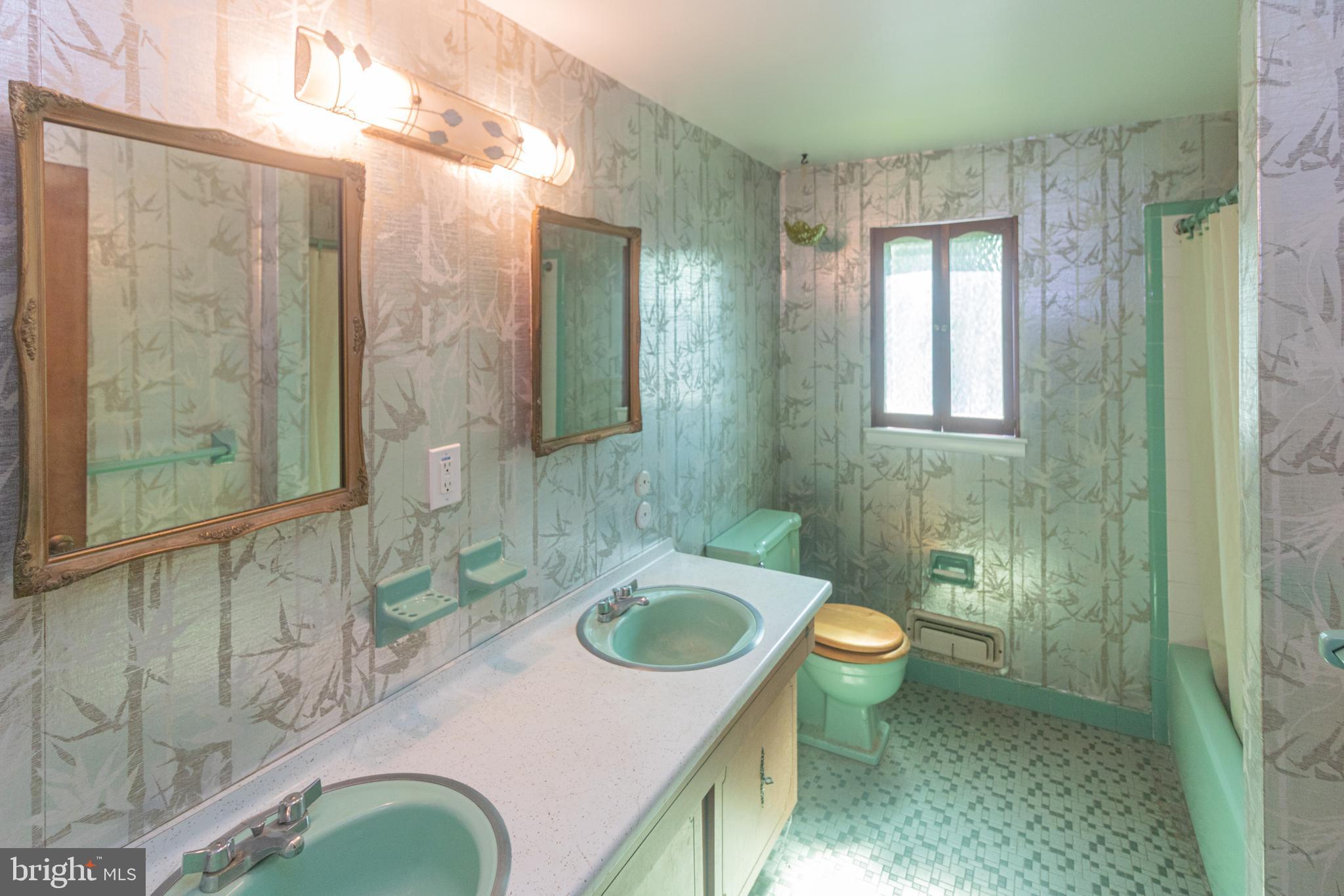 25 Champlain Road Marlton, NJ 08053 - Photo 23 of 35 a bathroom with a sink a toilet and shower