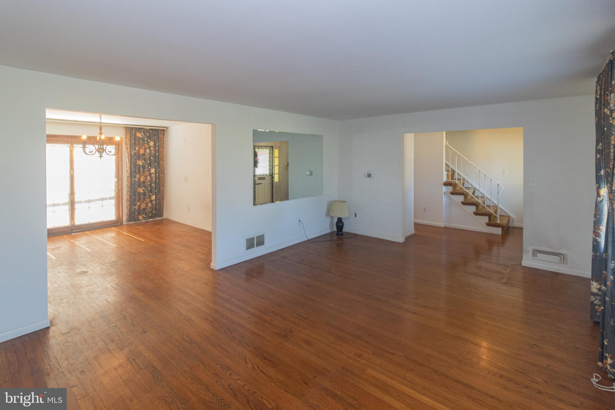 25 Champlain Road Marlton, NJ 08053 - Photo 5 of 35 an empty room with wooden floor and windows