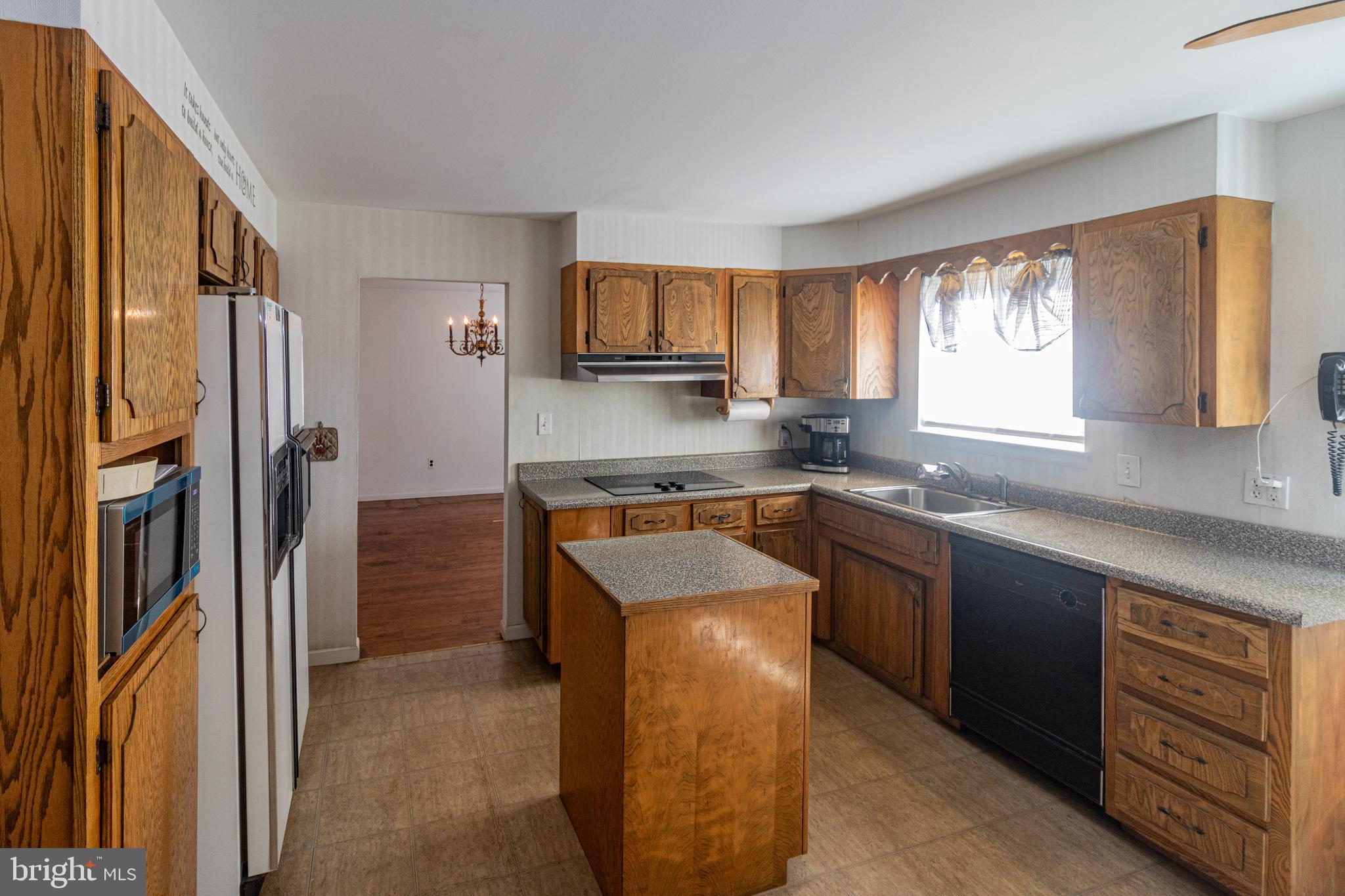 25 Champlain Road Marlton, NJ 08053 - Photo 8 of 35 a kitchen with stainless steel appliances granite countertop a sink stove and refrigerator