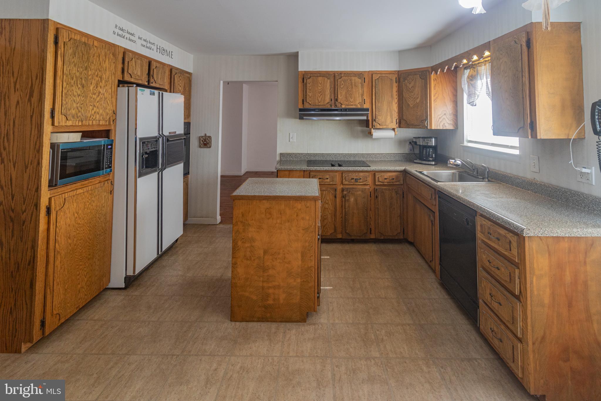 25 Champlain Road Marlton, NJ 08053 - Photo 9 of 35 a kitchen with stainless steel appliances granite countertop a refrigerator and a sink