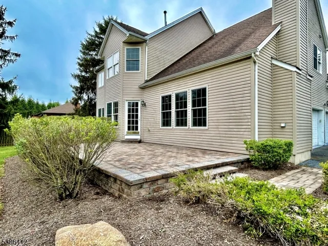 a house with trees in the background