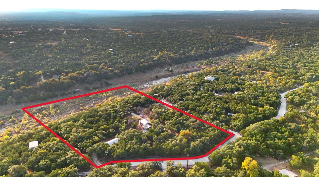 1910 Sandy Point Road Wimberley, TX 78676 - Photo 40 of 40 Aerial overview of property's location featuring a forest and property boundaries highlighted