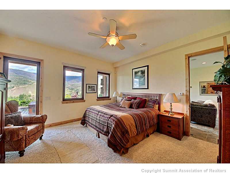 2560 Hunter's Knob Road Silverthorne, CO 80498 - Photo 15 of 25 Master Bedroom. 2nd master bedroom in lower level has walk out to patio with hot tub