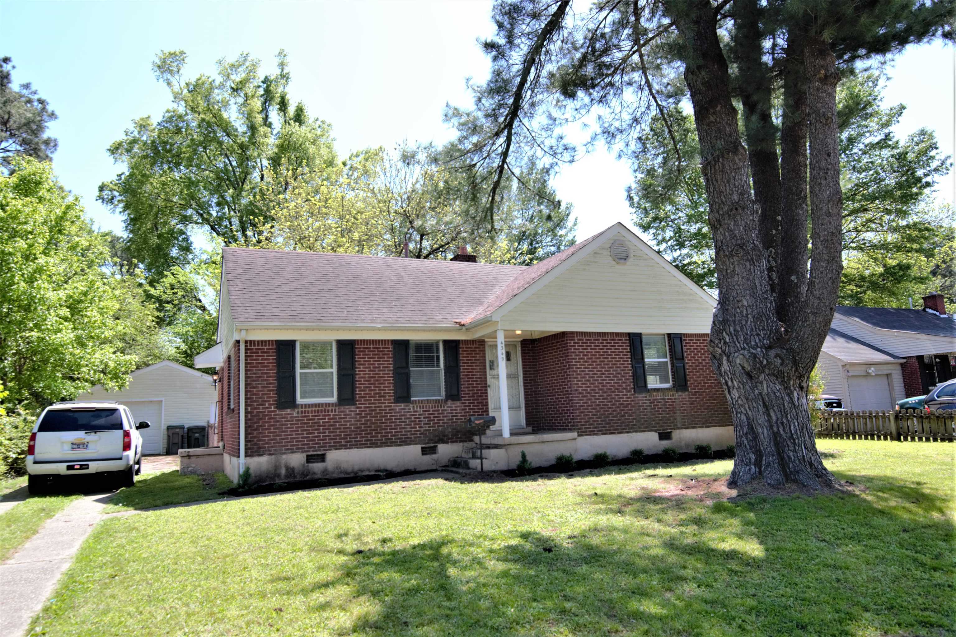 4349 Macon Road Memphis, TN 38122 - Photo 1 of 19 a view of a house with a yard
