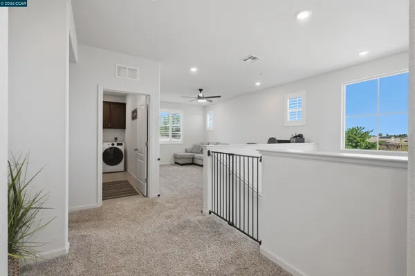 a view of a hallway with workspace