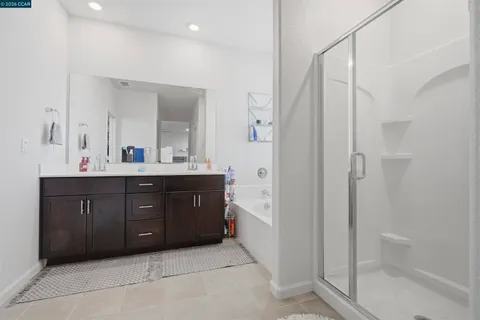 a view of a backyard with a garden and deck