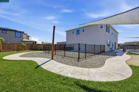 an aerial view of a house with a lake view