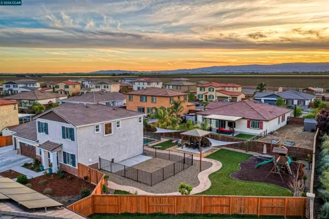 a view of a yard with a slide