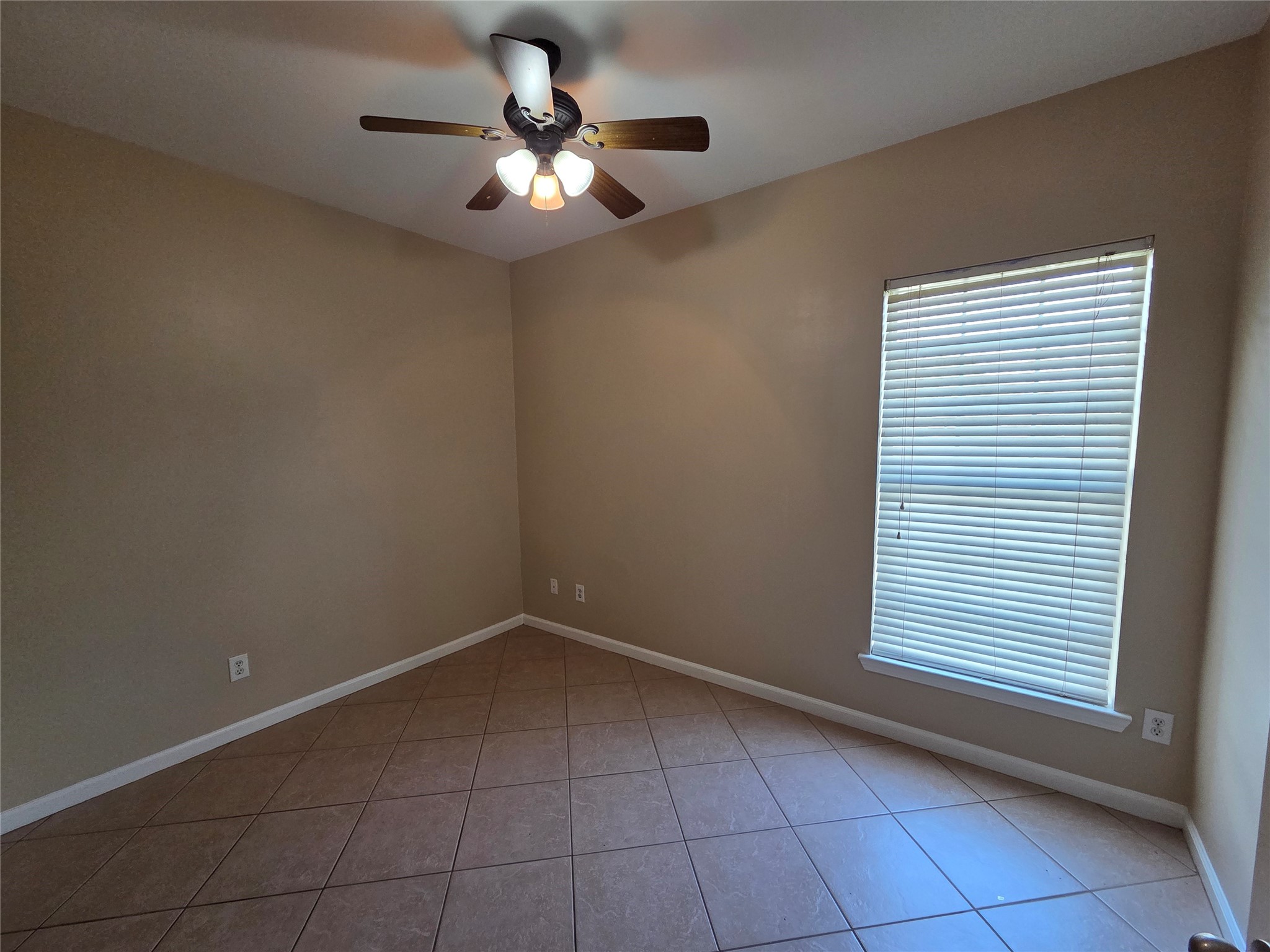 928 Runneburg Road Crosby, TX 77532 - Photo 11 of 26 a view of an empty room with a window