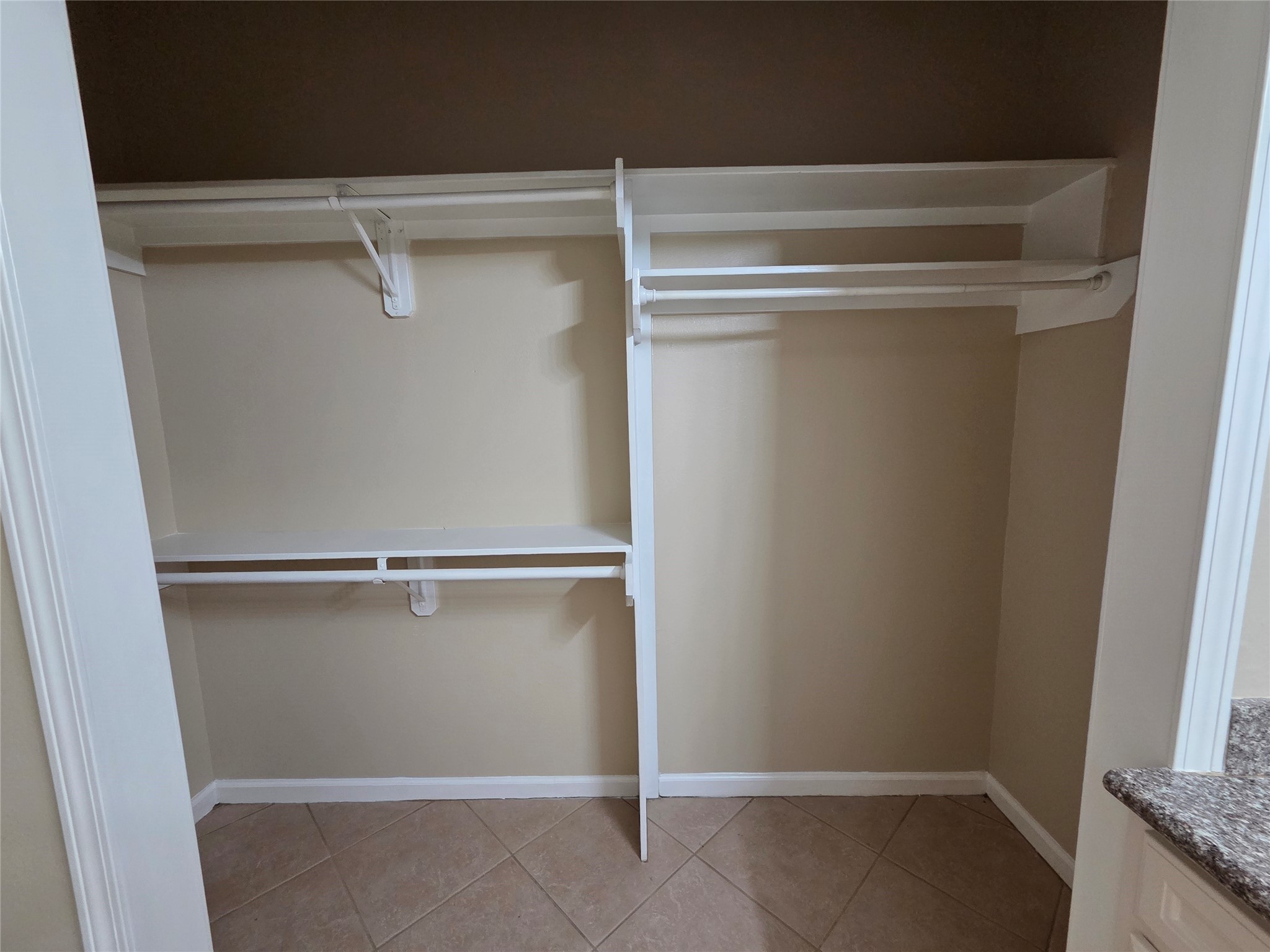 928 Runneburg Road Crosby, TX 77532 - Photo 16 of 26 a view of an empty walk in closet