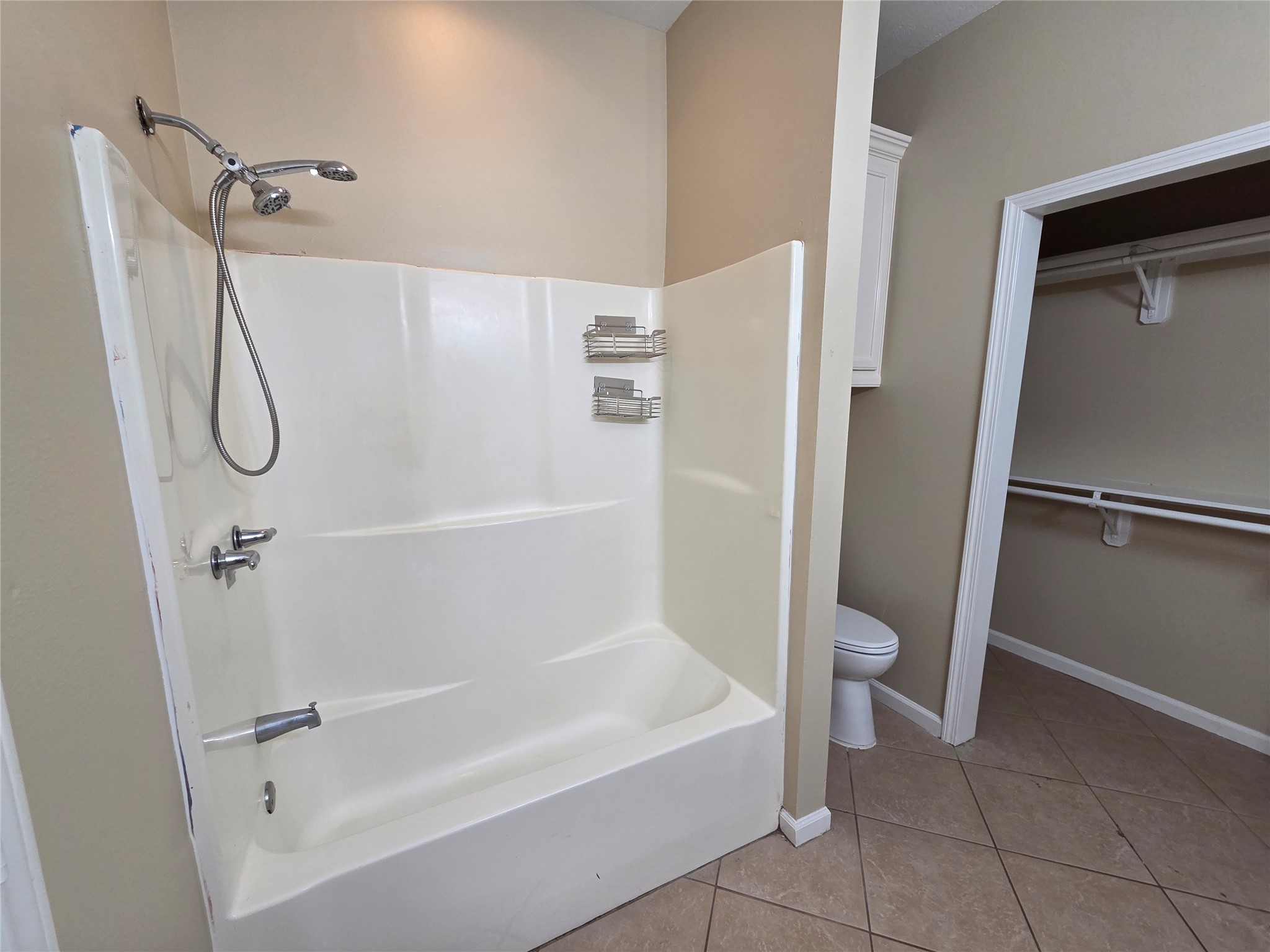 928 Runneburg Road Crosby, TX 77532 - Photo 18 of 26 a bathroom with a granite countertop shower a toilet and a sink