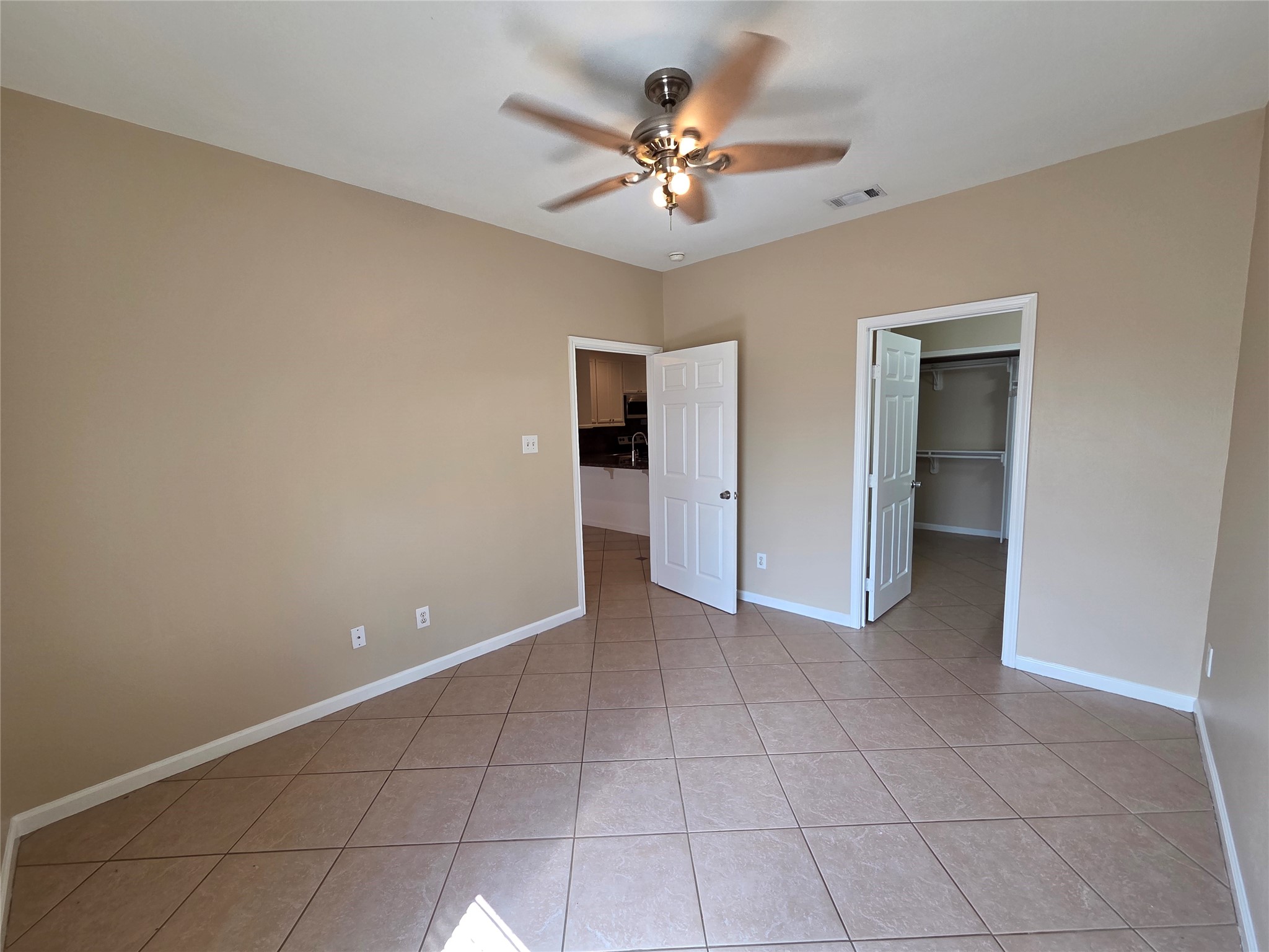 928 Runneburg Road Crosby, TX 77532 - Photo 20 of 26 a view of an empty room with a ceiling fan