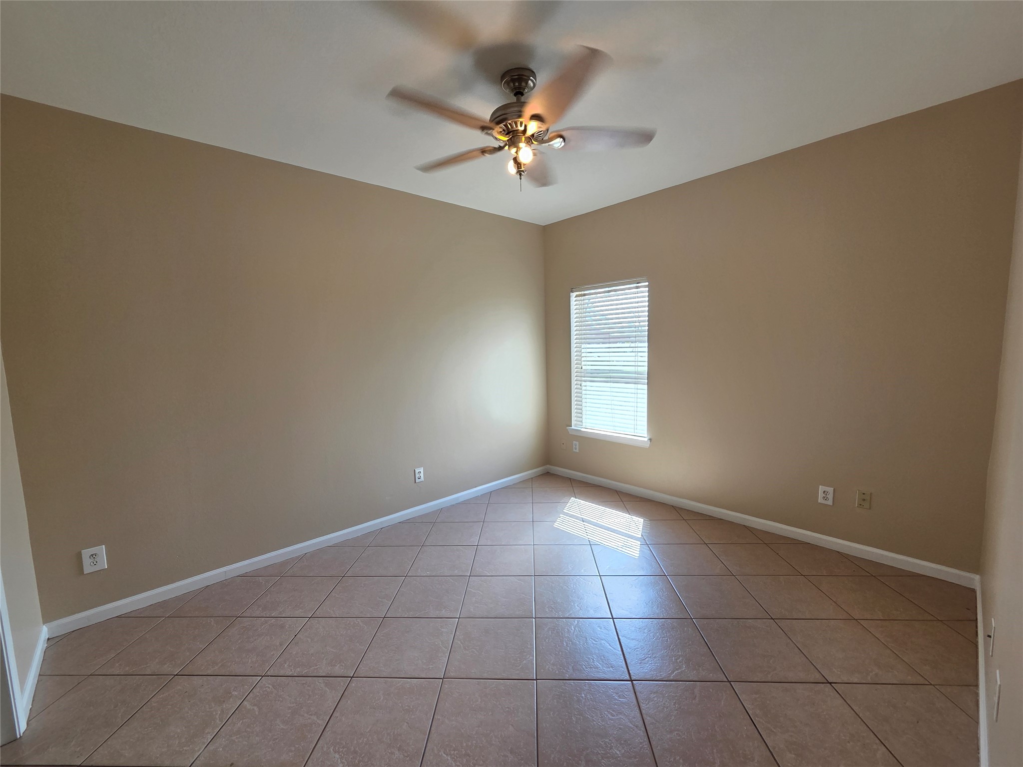 928 Runneburg Road Crosby, TX 77532 - Photo 24 of 26 a view of an empty room with a window
