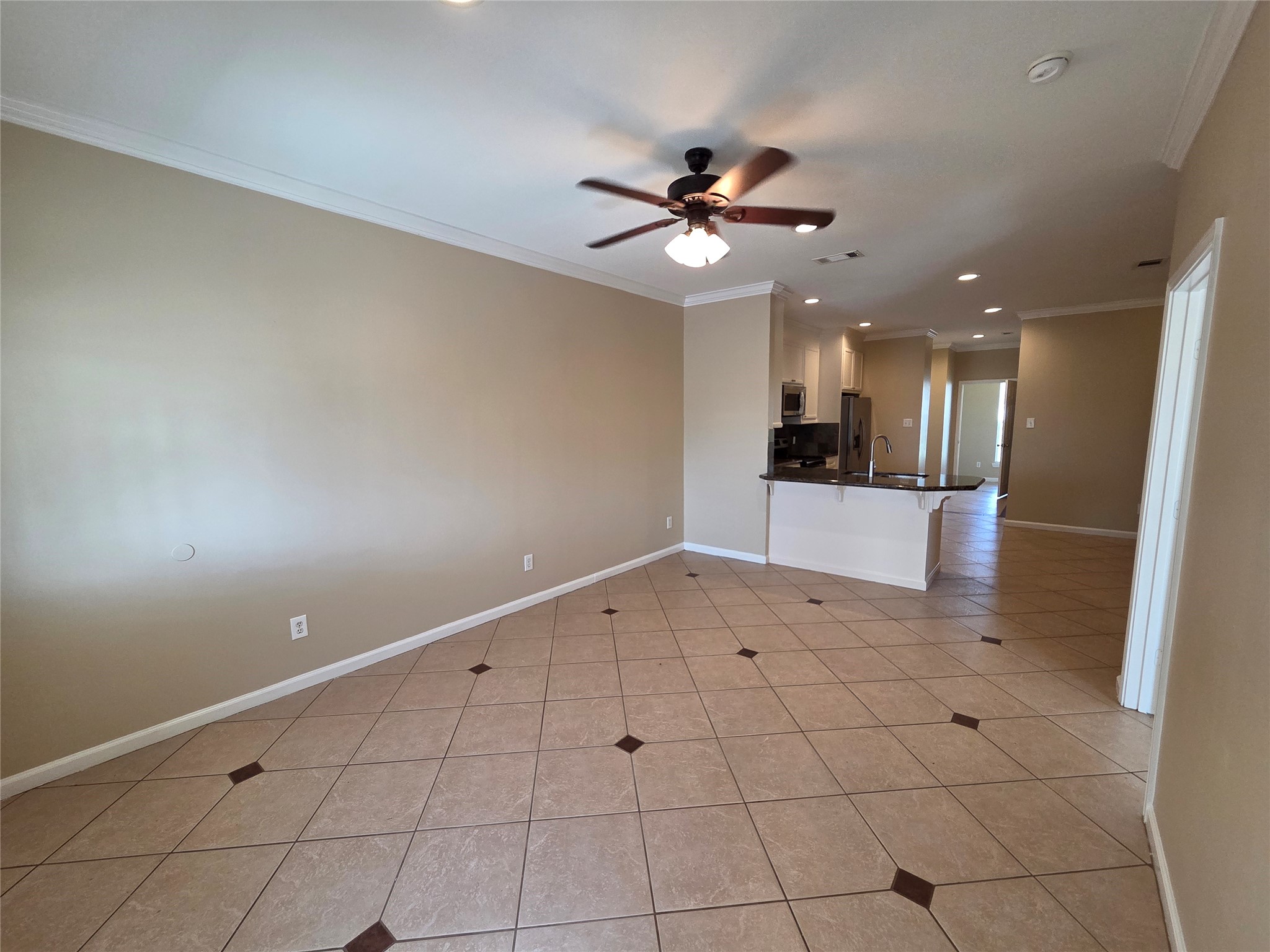 928 Runneburg Road Crosby, TX 77532 - Photo 4 of 27 a view of a kitchen with a sink and a window
