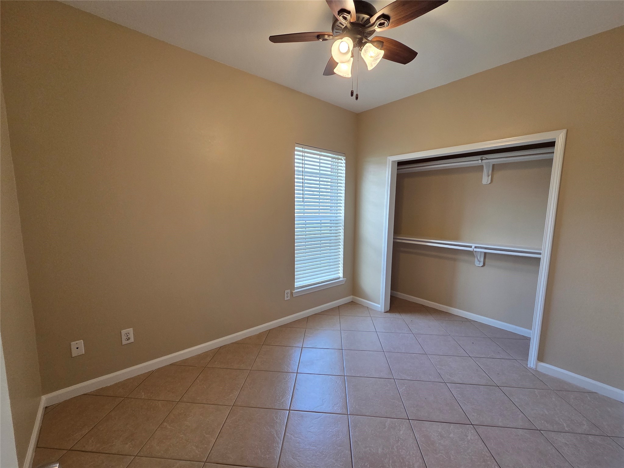 928 Runneburg Road Crosby, TX 77532 - Photo 9 of 26 a view of an empty room with a window